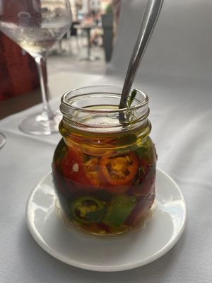 Peperoni-Öl als Snack mit Pizza-Brötchen  at Tango in Lugano