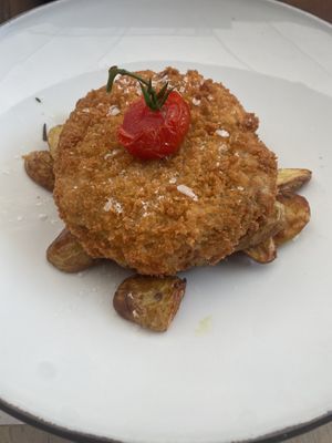 Eggplant Cordon Bleu (filled with vegan cheese and ham) with baked potatos (very good)  at Argentino in Lugano