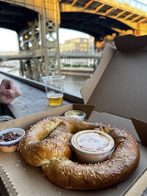 Pretzel 🥨 with mustard - but the other sauces are not plant basedd  at Lakefront Brewery in Milwaukee