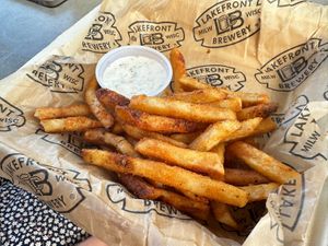 Crispy fries and vegan 🌱 sauce options   at Lakefront Brewery in Milwaukee