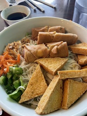 Noodle bowl with egg rolls and fried tofu   at Pho 16 in West Palm Beach