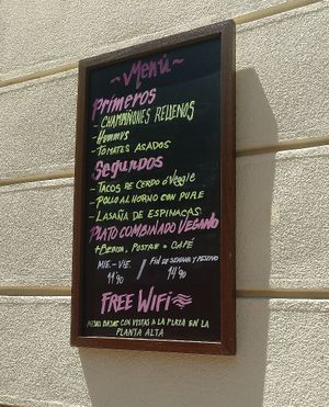 outside sign at Domi in Madrid