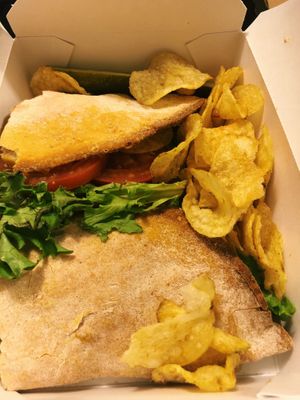 I think this was a BLT. All their sandwiches come in pizza crusts, so unique! I prefer the vegan Philly cheesesteak, but ate it too fast for a picture!  at Brick Road Pizza Co in Grand Rapids