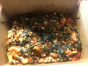 Gf pasta with lentil meatballs with pine nuts, broccoli, fresh basil added at Brick Road Pizza Co in Grand Rapids