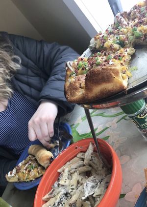 Vegan loaded potato pizza and mushroom alfredo w/ breadsticks  at Brick Road Pizza Co in Grand Rapids