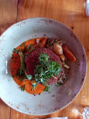 Beetroot patty with roasted vegetables at Gamli Baukur in Husavik