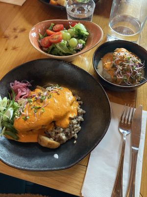 Soy Schnitzel with roasted vegetables and barley; cauliflower side dish; side salad  at Gamli Baukur in Husavik