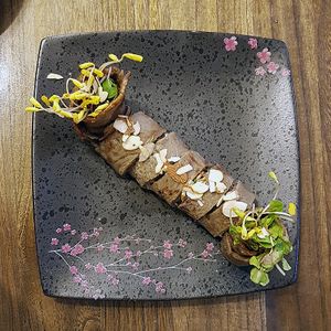 Buckwheat pancake filled with buckwheat sprouts.
(Memilsun Jeonbyeong 메밀순 전병) at Memiljaengi - 메밀쟁이 in Seoul