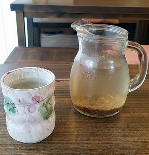 Buckwheat tea, served for free beside water at Memiljaengi - 메밀쟁이 in Seoul