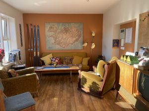 Beautiful sitting room attached to hostel where you can drink coffee at Cafe Nu in Stykkisholmur