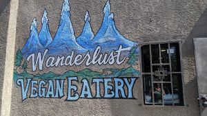 Cute outside mural at Wanderlust Vegan Eatery in Albuquerque