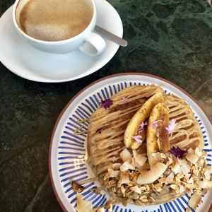 Vegan pancakes and coconut latte at Cotidiano in Lisbon