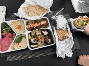 Makali (wrap on right), Falafel (wrap to the left of Makali), and Vegan Teller (all of the rest) at Bistro de Libanon in Leipzig