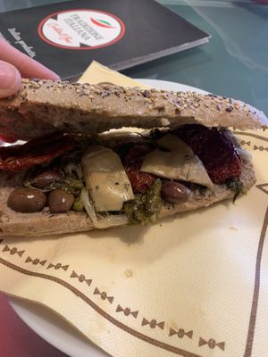 Sandwich with olives, sundried tomatoes, artichokes and spinach.  at NAP - Tradizione Italiana Cocktail Bar - T1 in Naples