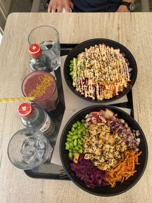Two build your own poké bowls. One with soy sauce dressing, one with spicy mayo.  at Poké Lagos in Lagos