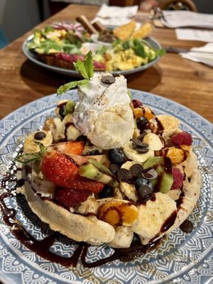 Special waffle with vanilla ice cream and mixed fruits  at Bio Cafe in Aberdeen