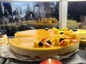 Mango 🥭 cheesecake   at Bio Cafe in Aberdeen