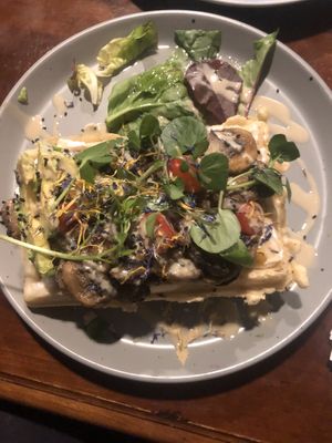Mushroom & avocado waffle  at Bio Cafe in Aberdeen