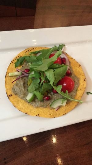 Charred eggplant tostada, special for vegan restaurant week  at Charcoal Bistro Wash Park in Denver