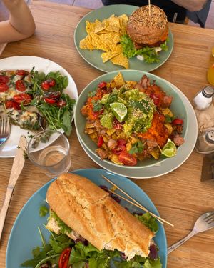 Mozarella toast (vegetarian) + mexican burger + nachos to share + vegan sandwich. at Tierra in Tenerife