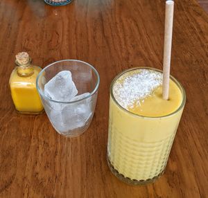 Guanabara smoothie, with a turmeric shot on the side at Tierra in Tenerife