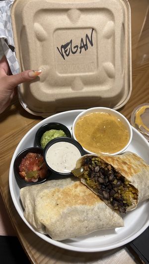 Vegan wet burrito with soyrizo (ordered to go 🌯)  at The Church Cantina in Tacoma