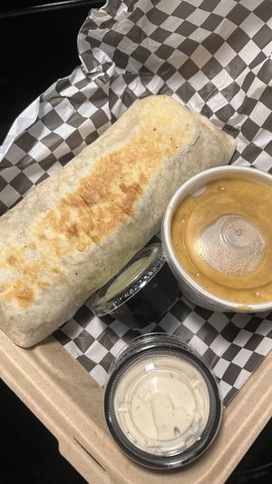 Vegan wet burrito with soyrizo (ordered to go 🌯)  at The Church Cantina in Tacoma