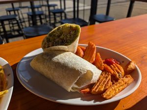 Green River wrap with sweet potato wedges at The Church Cantina in Tacoma