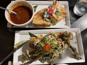 From medium size dishes, broccolini and masaman with roti.   at Yulli's in Byron Bay