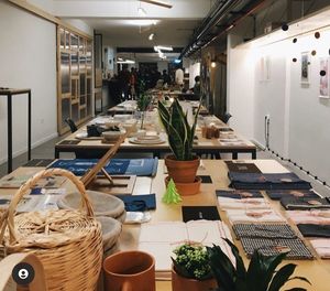 Exposition in the café at Temporada Cowork Cafe in Porto