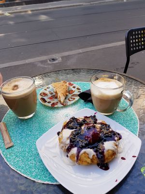 Salty Caramel Cheesecake and Papanasi...definitely recommend the papanasi!! at Level Up in Bucharest