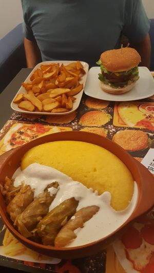 Sarmale de post with mamaliga, wedges and smokey burger at Level Up in Bucharest