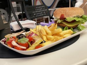 Double burger (29 LEI) with salad and fries (9 LEI)  at Level Up in Bucharest