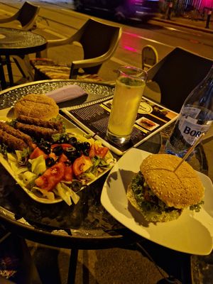 Vegfish burger and mici with salad at Level Up in Bucharest