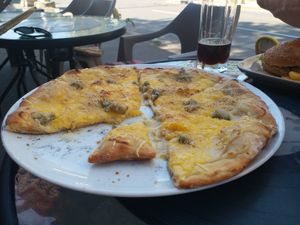 Quattro formaggi pizza at Level Up in Bucharest