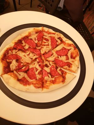 Pizza with homemade cheese and salami! at Level Up in Bucharest