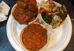 Clockwise from top left: okra stew, cauliflower medley, baked beans at Sweet Home Cafe in Washington