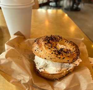 v everything w v plain cc & chai!   at WoodGrain Bagel in Boulder
