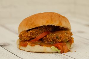 Shambhala - Tofu in batter, Shambhala leaves, hot curry sauce, tomato slices, pickles, iceberg lettuce
 at Vega in St Petersburg