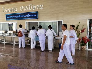 Queuing for buffet food at Wat Phra That Pha Son Kaeo in Phetchabun