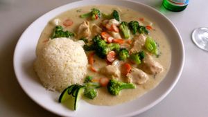 Vegan 'duck' with vegetables, rice and a creamy sauce. at Vegefarm in Bremen