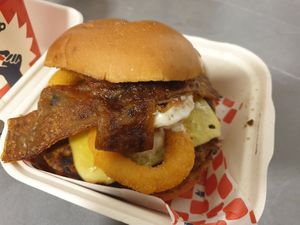 The Dirty Boy (smash patty, cheese, onion rings, facon, bbq sauce, aioli) NZ$16.90: YUM at Wise Boys Burgers in Auckland