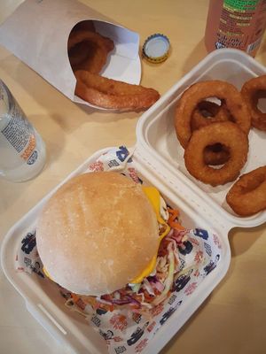 Burger with crispy onion rings! at Wise Boys Burgers in Auckland