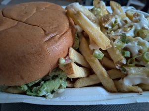 The Dr. Greenthumb burger with garlic fries. at Golden Fleece in Nottingham
