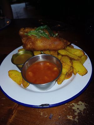 Fantastic battered sausage and chips. Can't recommend this classic enough. at Golden Fleece in Nottingham