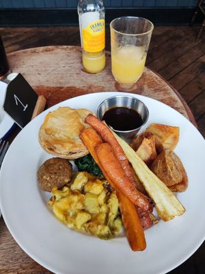 Pie with roast potatoes, cauliflower cheese and veg at Golden Fleece in Nottingham