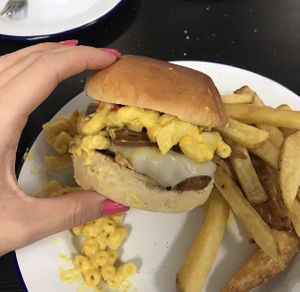 Attack of the mac burger with vegan homemade chips  at Golden Fleece in Nottingham