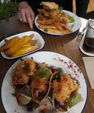Fishish tacos, cheesy chips and bannana blossom fish and chips (on special) 😋😋 at Golden Fleece in Nottingham