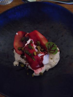 hibiscus poached apples, sweetened cream and pistachio meringue at Saorsa 1875 in Pitlochry