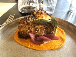 Roasted cauliflower, smoked carrot purée, fried cauliflower leaves & pickled red onion at Saorsa 1875 in Pitlochry